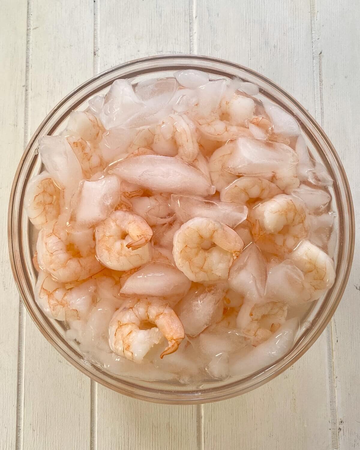 cooked shrimp in an ice bath.