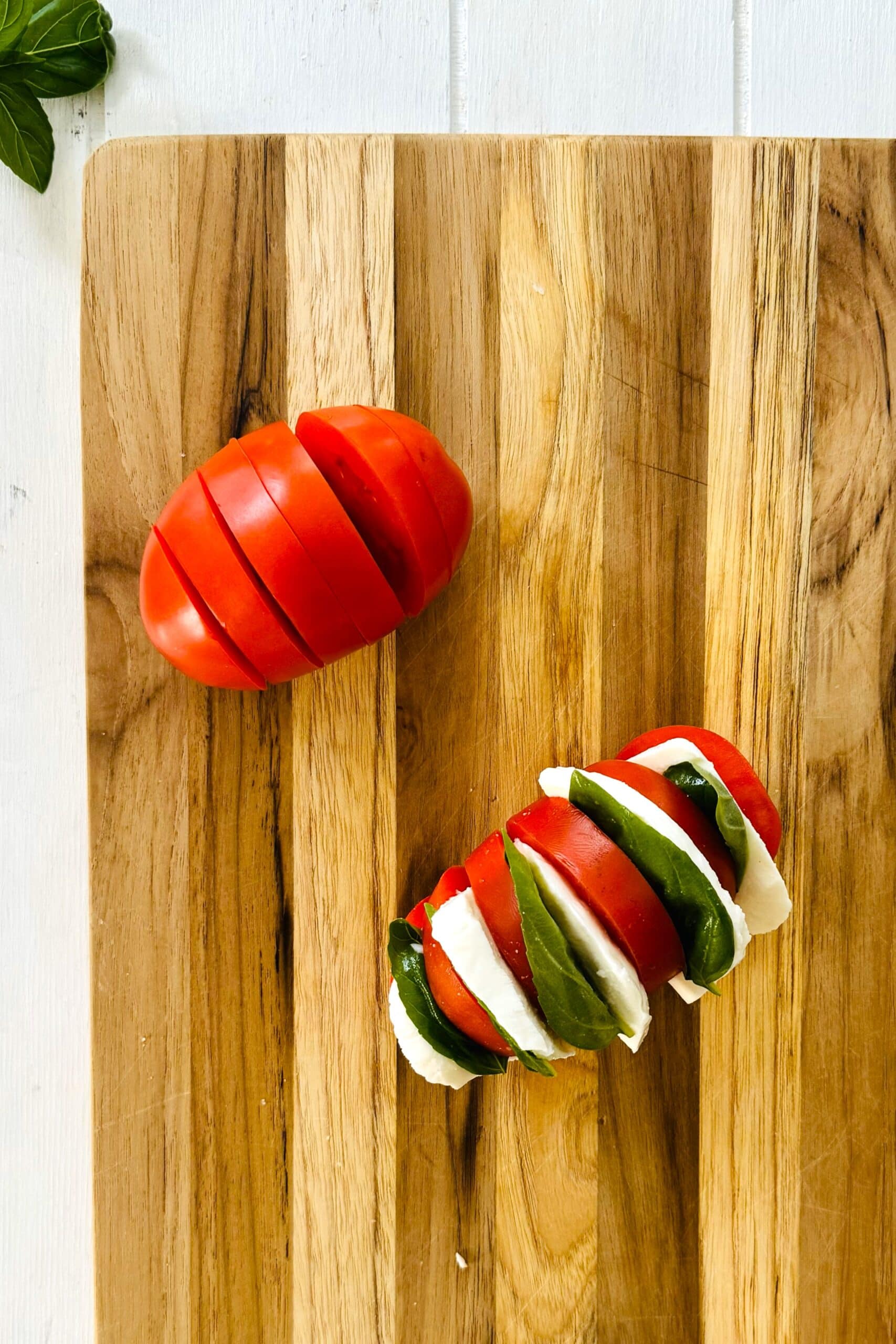 sliced tomato and mozzarella stuffed tomato.