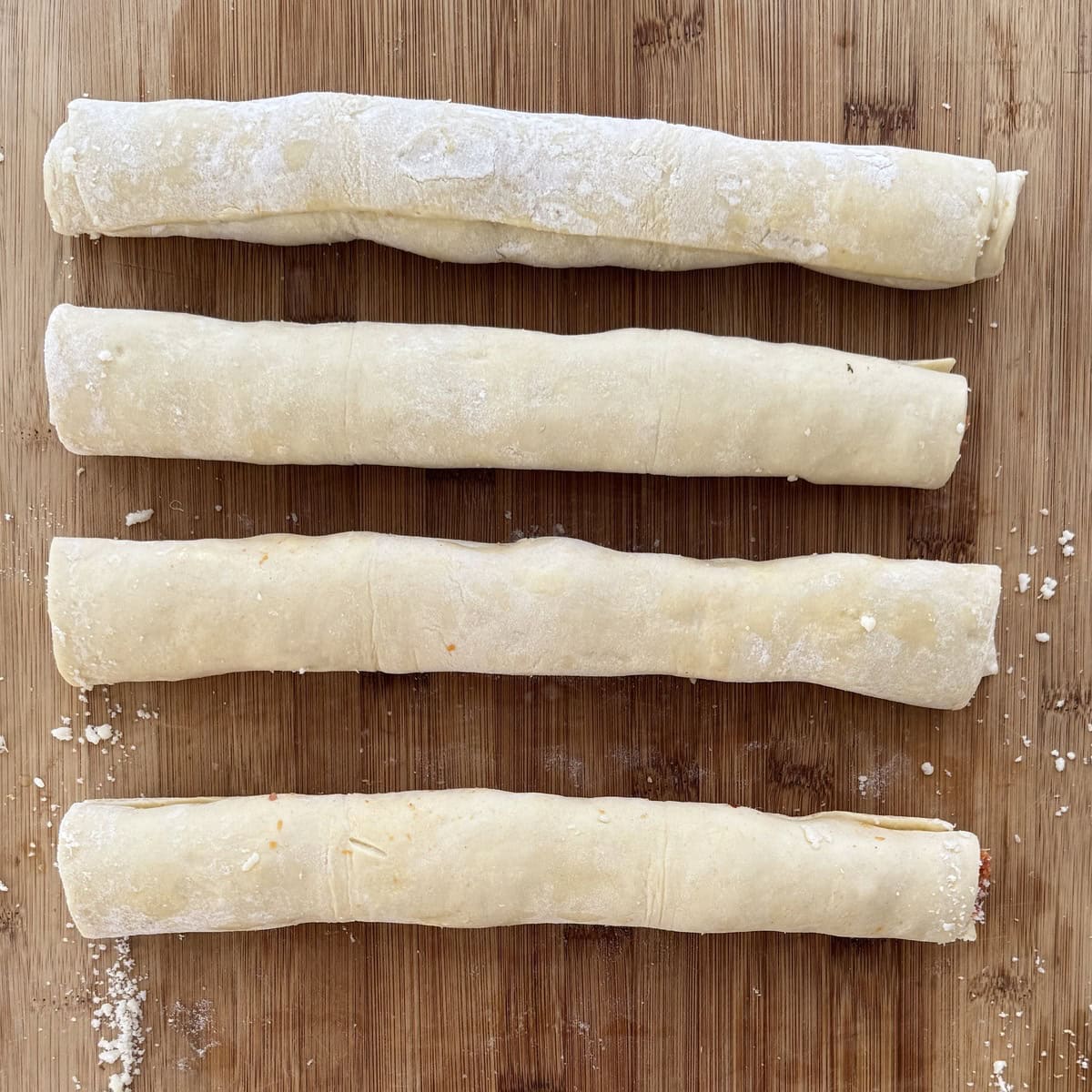 Homemade sausage rolls that are not baked.