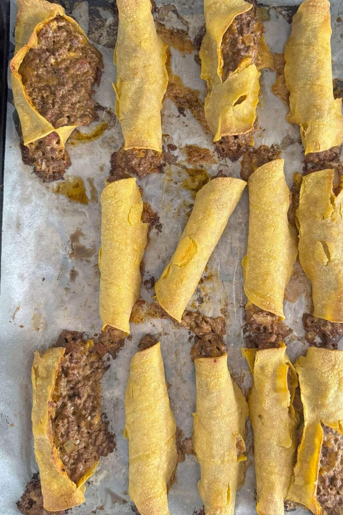 Beef and cheese taquitos that burst open when baking.