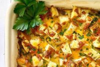 Loaded Breakfast Egg Bake with Sausage, Spinach, Mushrooms, and Croutons