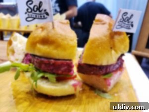Sol Cuisine plant-based burger served in a professional setting