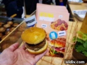 Impossible Foods plant-based burger being served