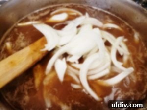 Mark Bittman's Fast Pho Kit: Peapod's Delicious One-Touch Convenience 21 Adding sliced sweet onion to pho