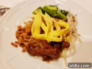 Arun's Thai: A Culinary Investigation 17 Close-up of rice noodles with pork and omelet strips