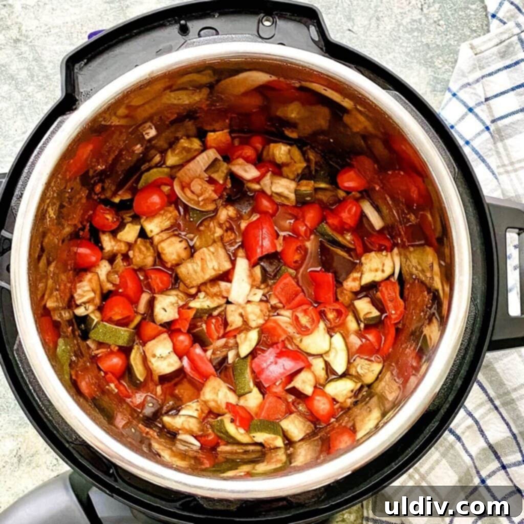 Ratatouille cooked and simmering in a crock pot.