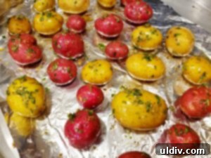 Lemon Balm Potato Salad: Summer's Zesty Perfection 3 Roasted potatoes seasoned with fresh herbs, ready for the salad