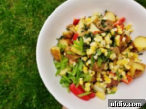 Lemon Balm Potato Salad: Summer's Zesty Perfection 5 The finished lemon balm potato salad, garnished and ready to serve
