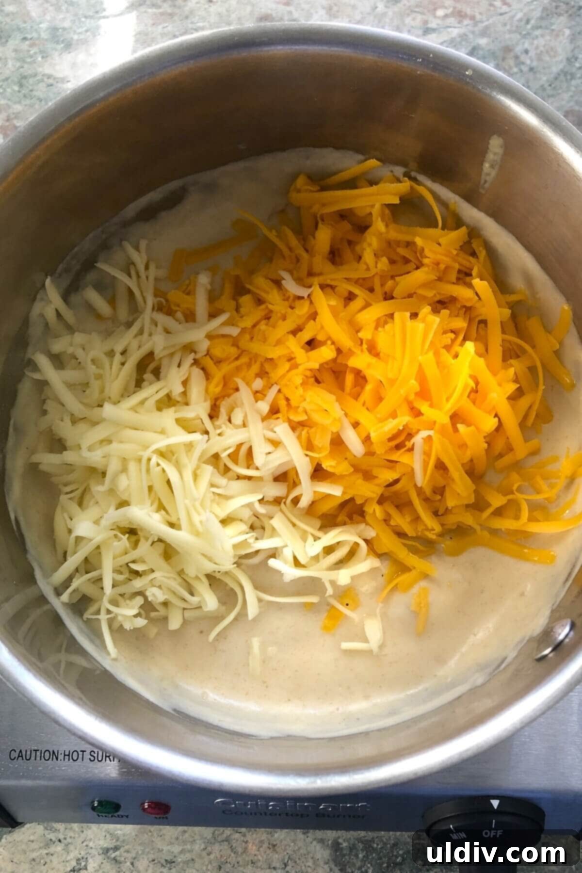 Party-Perfect Mac and Cheese Bites 6 adding 2 kinds of cheese to a cheese sauce.