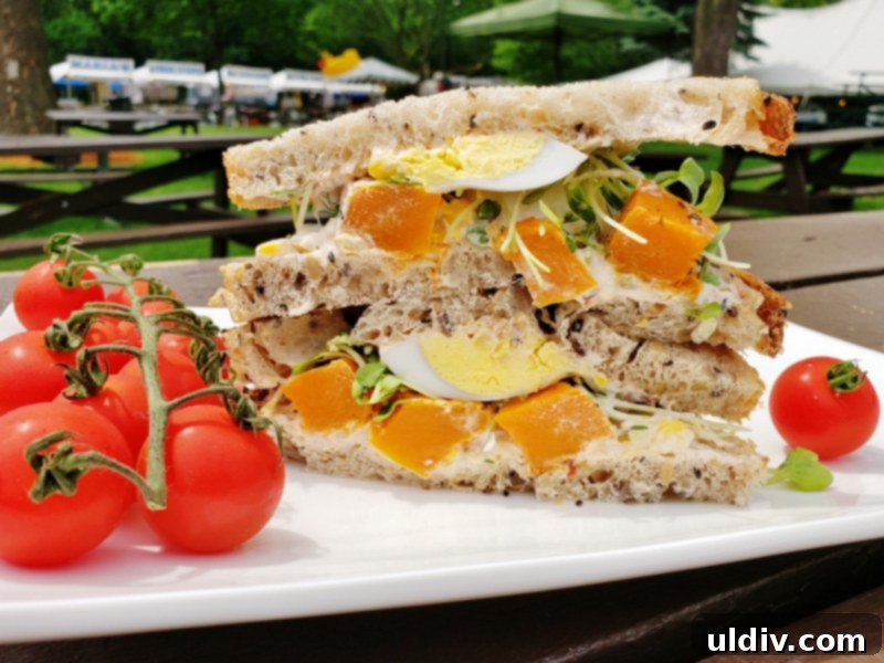 Flavorful Rustic Duck Egg Sandwich Your Meatless Monday Essential 11 The completed duck egg and butternut squash sandwich served alongside fresh, ripe tomatoes