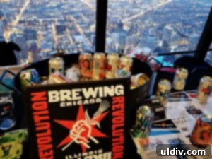 Craft beers and cocktails being served at 360 Hoppy Hour with city lights in background
