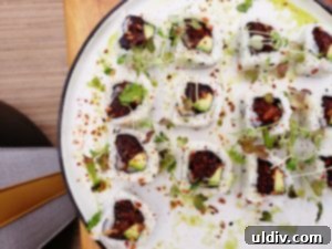 Beautifully presented spicy tuna roll with fresh ingredients