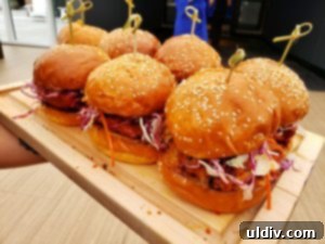 Delicious fried Amish chicken sandwich with slaw and hot sauce
