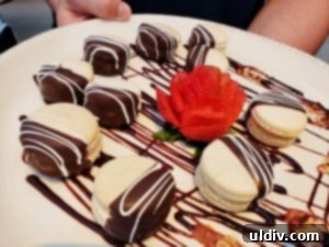 Close-up of a meticulously decorated dessert, possibly a small tart or pastry