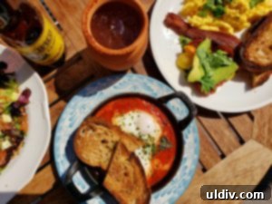 Etta A Taste of Hearth Magic 10 Etta's signature fire-roasted eggs cooking in a cast iron dish within the restaurant's hearth oven.