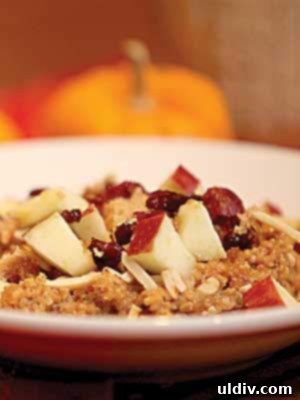 Cozy Pumpkin Spice Quinoa Morning 2 Spiced pumpkin breakfast quinoa topped with chopped apples.