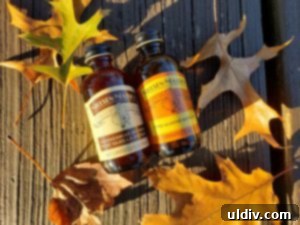 Find Your 2019 Holiday Gifts Spices Wines Books Coffee 3 Close-up of Nielsen-Massey vanilla and almond extracts, ready for baking