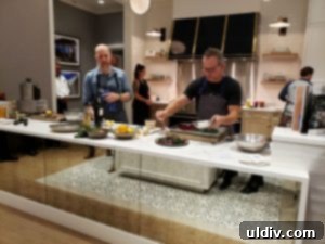 Find Your 2019 Holiday Gifts Spices Wines Books Coffee 10 Chef Paul Kahan demonstrating cooking techniques at an event