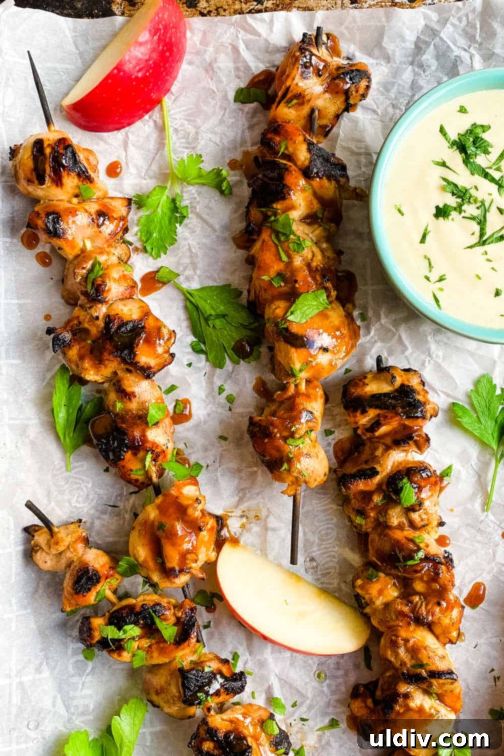 Honey-Glazed Cider Chicken Skewers with Sweet Mustard Sauce 2 Close-up of golden grilled chicken skewers with a cider honey marinade