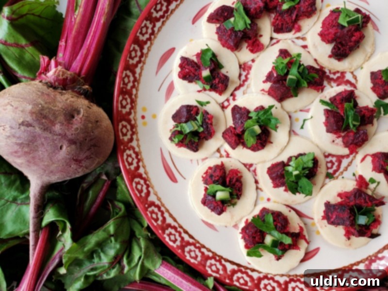 Super Bowl Vegan Snacks: Beetroot Appetizer & Plant-Based Game Day Recipes 8 Beetroot and horseradish salad garnished with parsley, served in a bowl.
