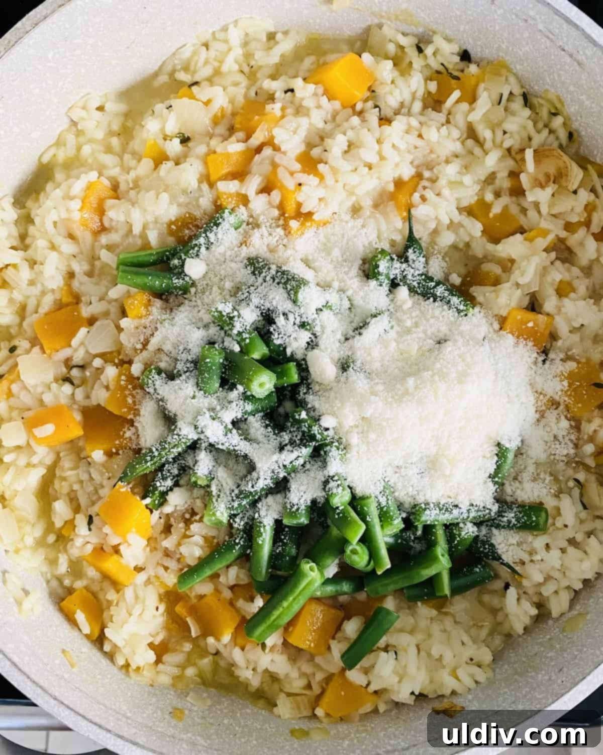 Golden Butternut Risotto 8 adding green beans and Parmesan cheese to easy rice recipe
