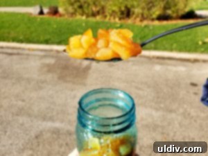 Homemade candied orange peel, glistening and ready for use