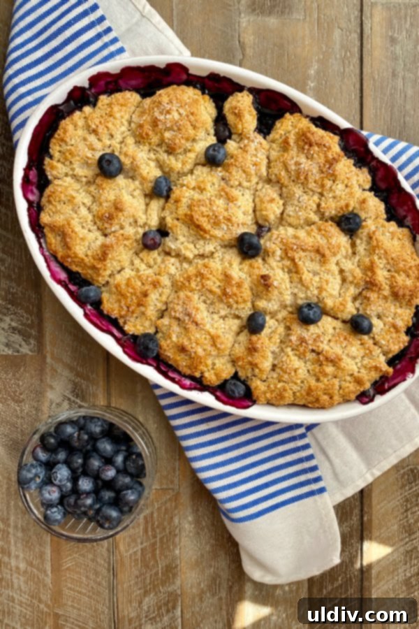 a fruit dessert with a cake like topping