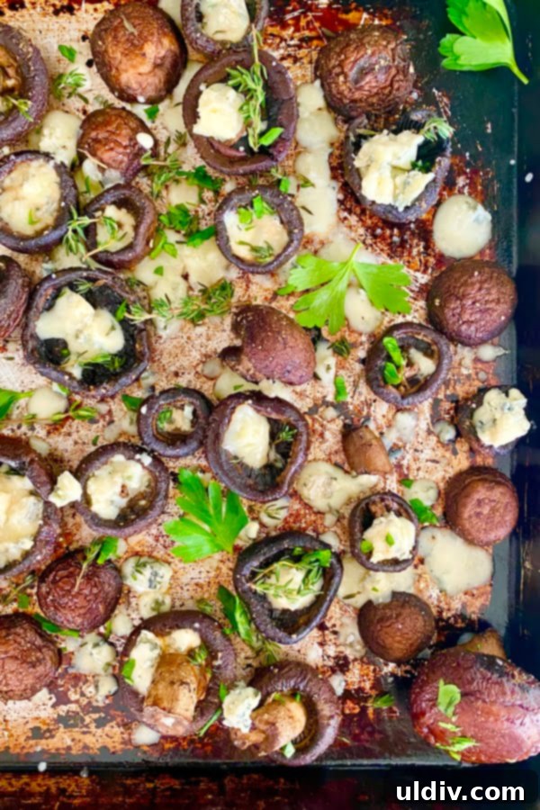 Decadent Garlic Butter Blue Cheese Mushrooms 2 Pan of baked mushrooms with butter, garlic, and blue cheese, ready to be served
