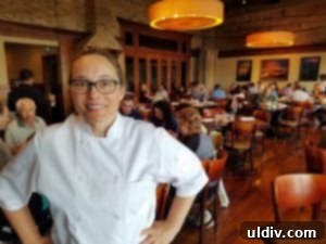 Chef Sarah Stegner, a James Beard Award winner, smiling in a professional kitchen setting.
