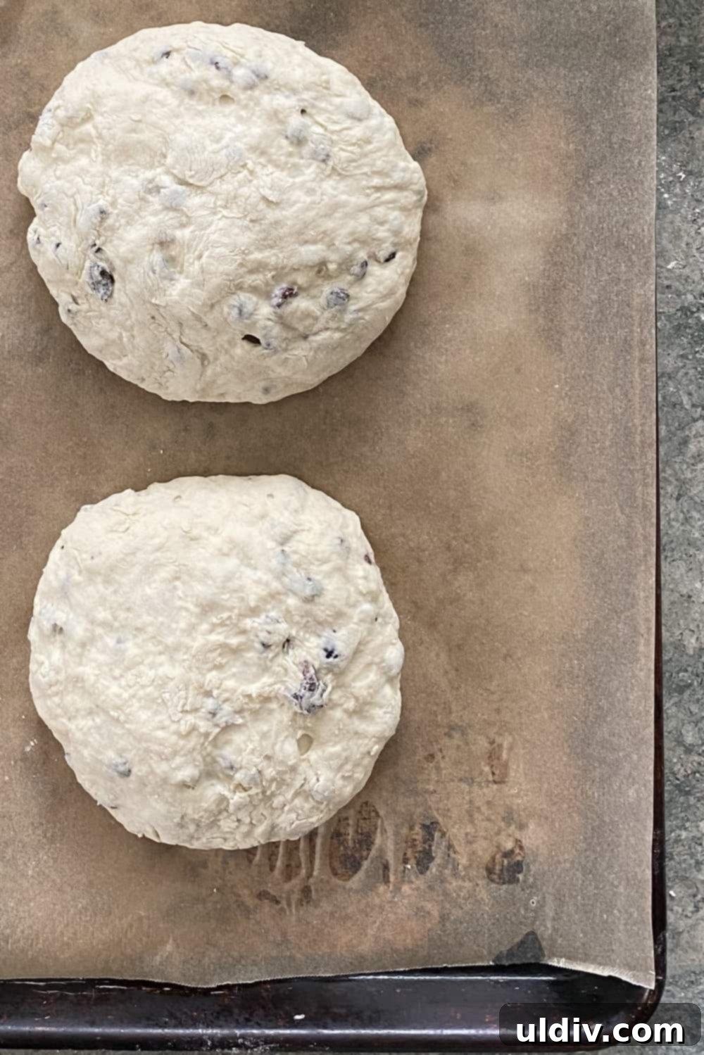 Homestyle Irish Soda Bread with Cranberry Currant Gems 4 2 unbaked loaves of Irish soda bread.