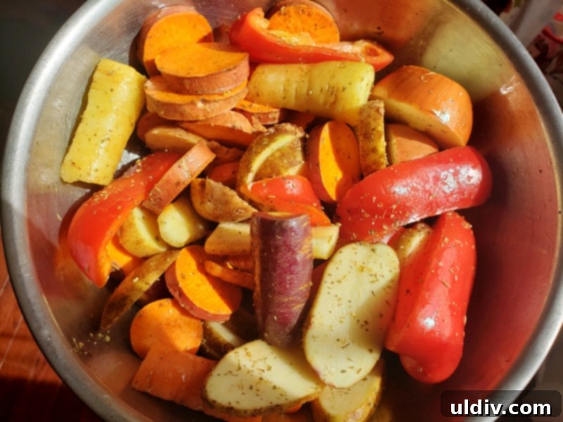 Grilled Veggies Leftover Breakfast Upgrade 4 Olive oil and oregano being massaged into grilled vegetables.