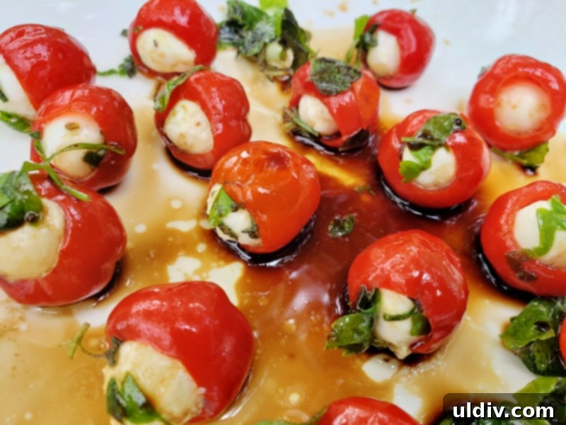 Herb-Packed Peppadew & Mozzarella 4th of July Appetizer 6 Close-up of stuffed Peppadew peppers with balsamic drizzle