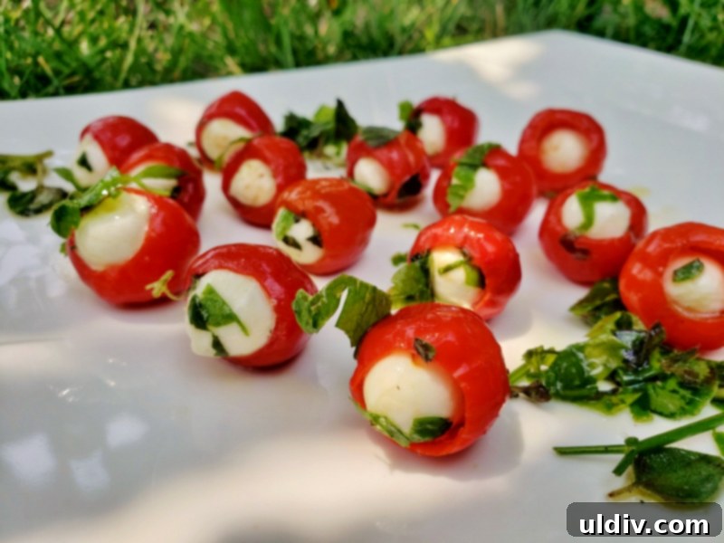 Herb-Packed Peppadew & Mozzarella 4th of July Appetizer 7 A small plate of stuffed Peppadew peppers