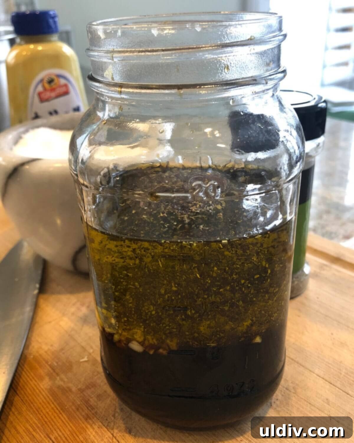 Balsamic Herb Grilled Steak Salad with Crumbled Blue Cheese 5 A homemade balsamic marinade/vinaigrette perfectly mixed in a mason jar, ready to infuse flavors.