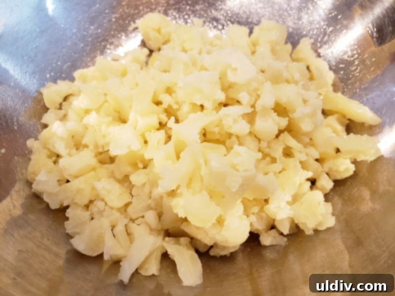 Cauliflower Mushroom Stuffed Peppers: Our Plant-Based Evolution 3 Boiled cauliflower ready for stuffing in bell peppers