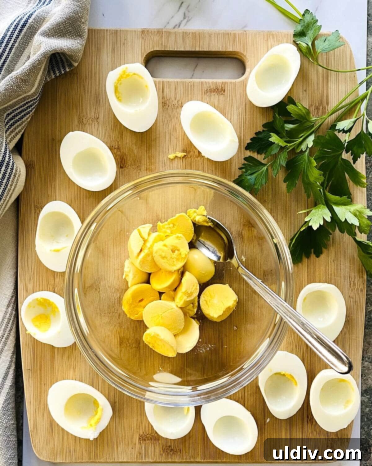 Pickle-Perfect Deviled Eggs 7 Hard boiled egg yolks and egg white halves.