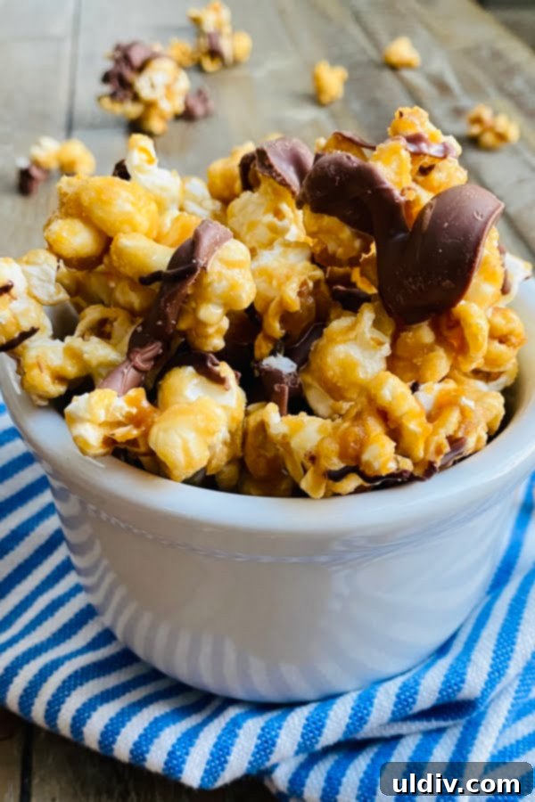 Irresistible Homemade Salted Caramel Popcorn 7 bowl of salted caramel popcorn with chocolate drizzle