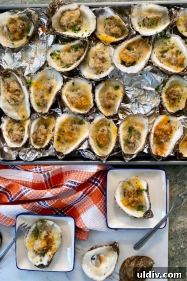 Effortlessly Delicious Baked Oysters 6 baking sheet with baked oysters with cheese