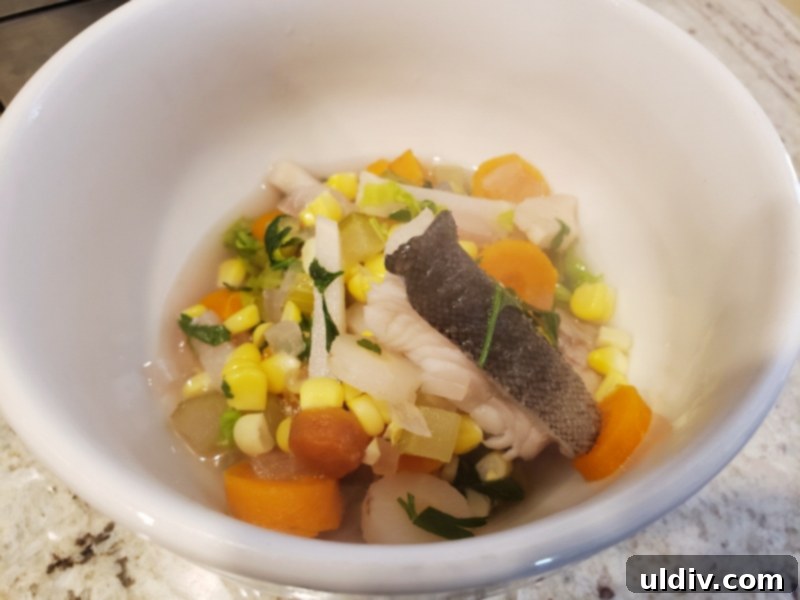 Autumn's Health Elixir: Dive Into Delicious Fish Soup 10 A serving of hot, fragrant, and healthy fish soup in a bowl.