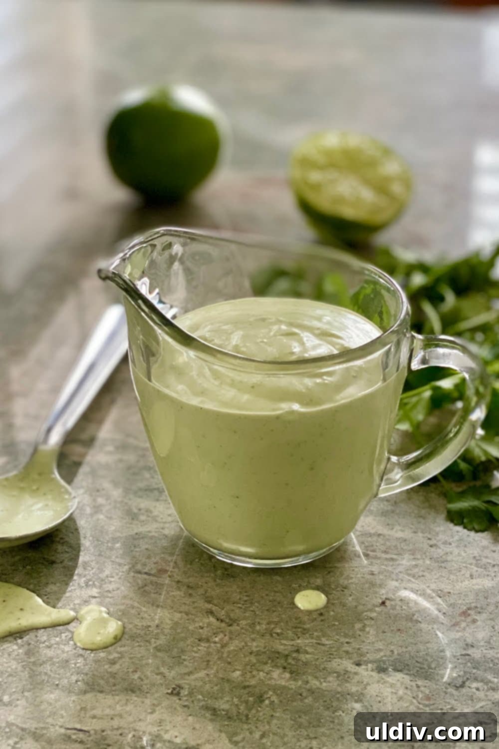 Velvet Cilantro Lime Dressing 4 salad dressing in a glass pitcher, ready to serve