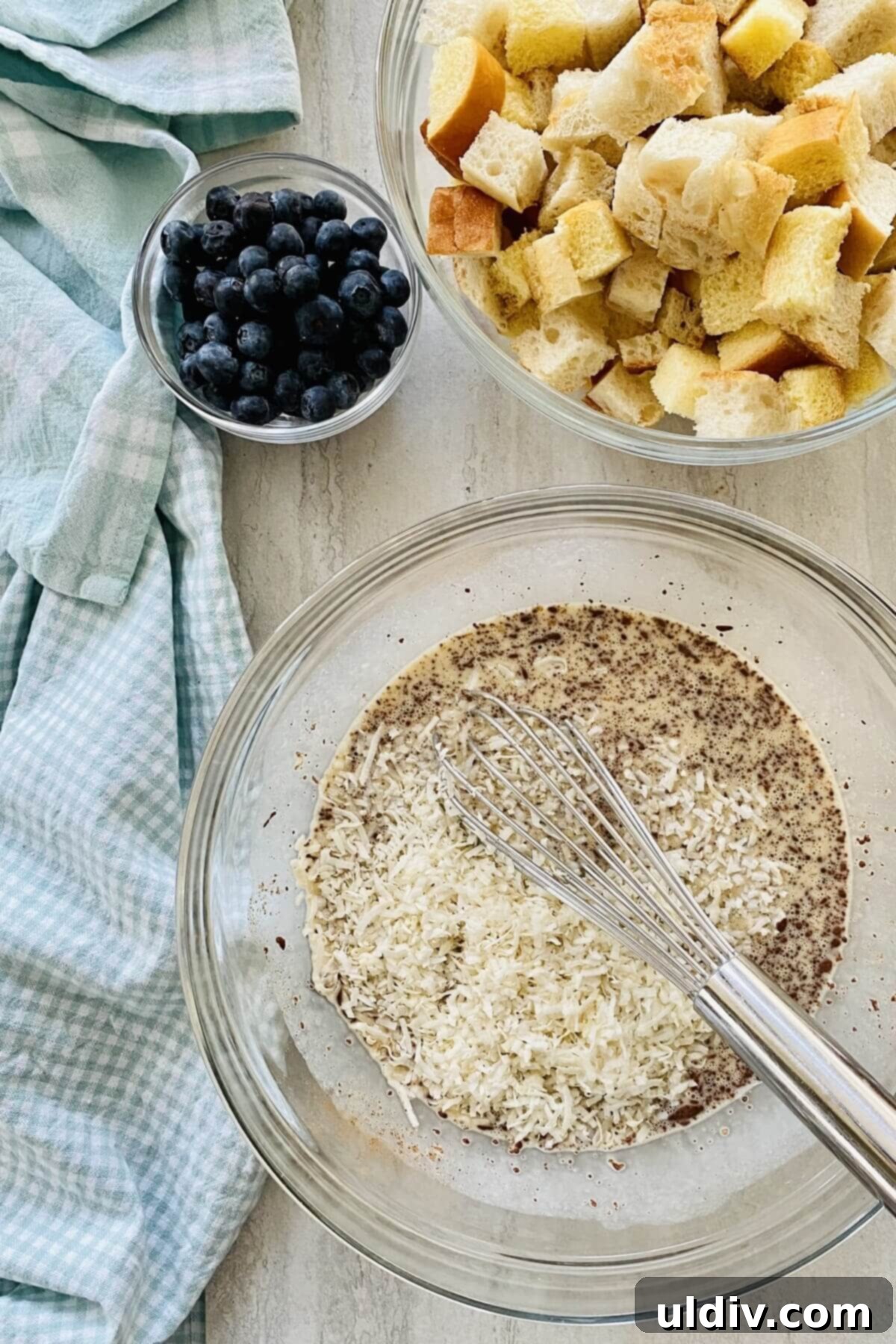 Blueberry Coconut Cinnamon French Toast Muffins 6 A bowl of rich, creamy custard, perfectly seasoned and ready to transform into decadent breakfast muffins.