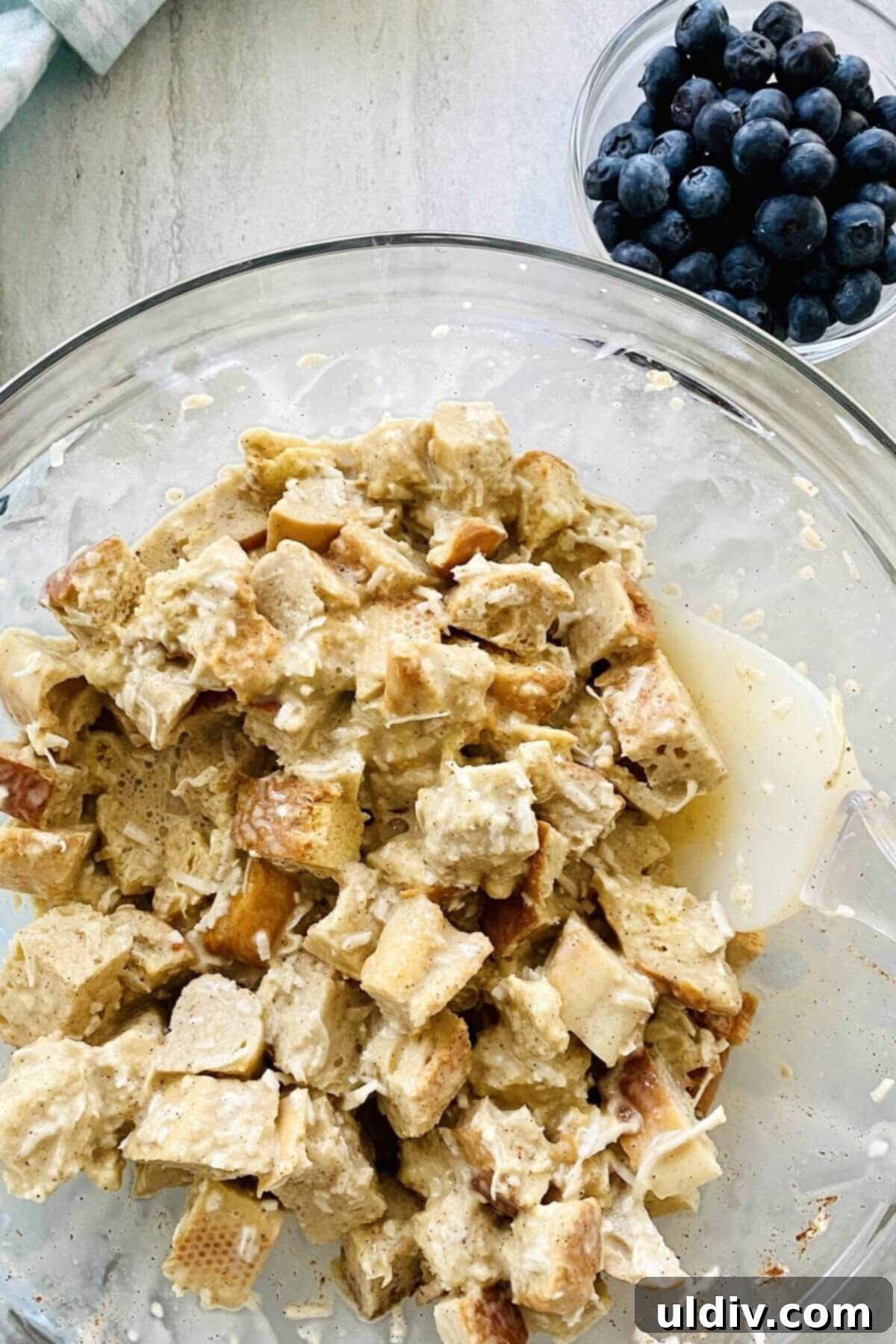 Cinnamon Coconut French Toast Muffins Bursting with Blueberries 7 Cubes of sturdy French bread soaking in the rich coconut custard, absorbing all the delicious flavors.