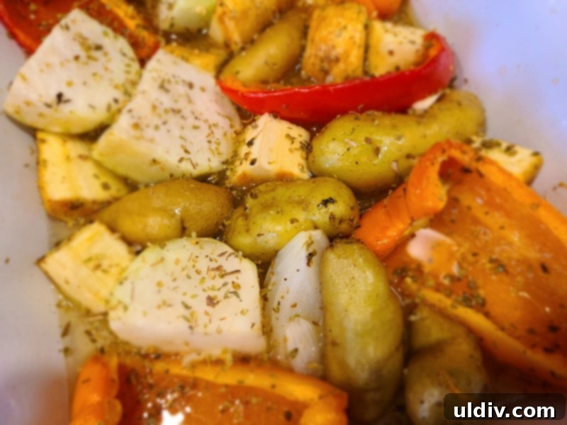 Feasting on Turkey and Duck: A Maple Leaf Farms Review 6 Roasting pans filled with seasoned vegetables and glazed fruits, freshly removed from the oven