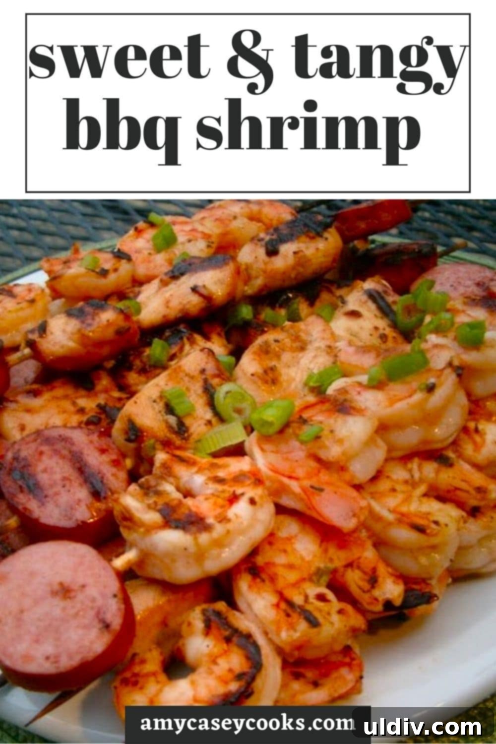 Tangy Glazed Shrimp Skewers 6 Appetizing display of bbq shrimp and kielbasa on wooden skewers, ready to be served.