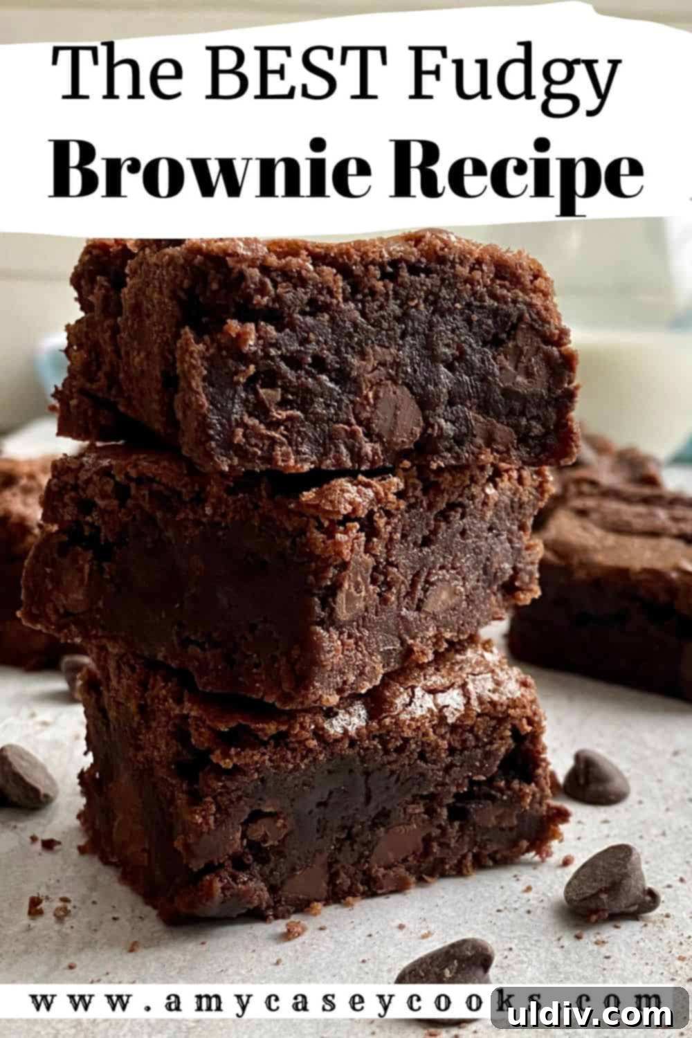 Your New Favorite One Bowl Fudgy Brownies 10 A beautifully stacked trio of fudgy brownies, highlighting their rich color and texture.