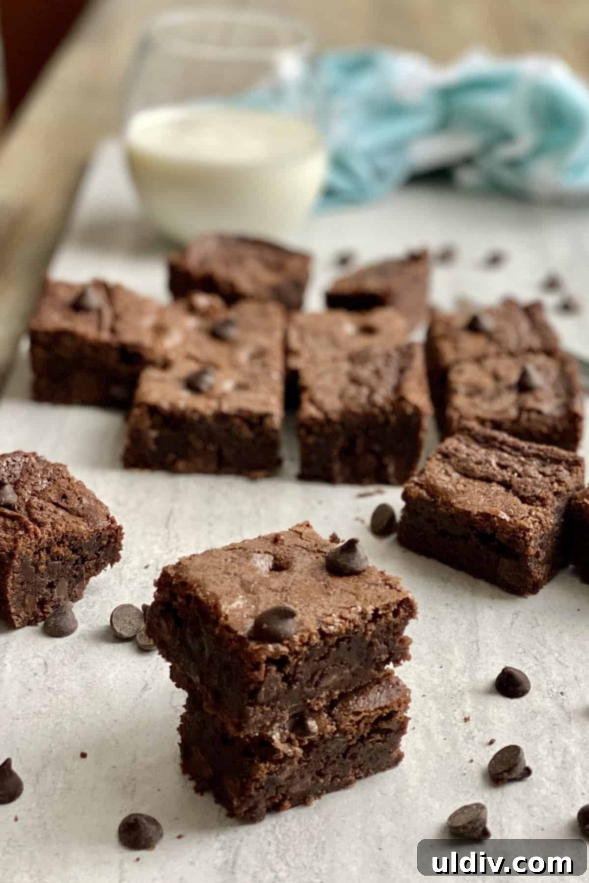 Your New Favorite One Bowl Fudgy Brownies 3 Close-up of chocolate bars and milk, hinting at the rich ingredients in these brownies.