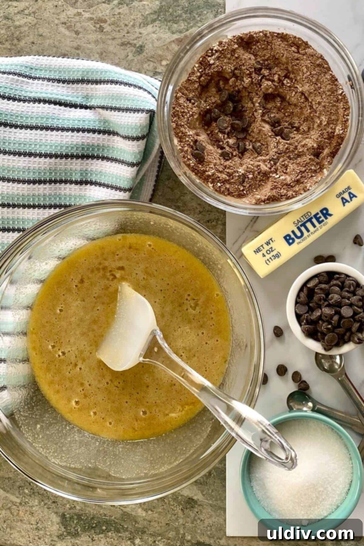 Your New Favorite One Bowl Fudgy Brownies 6 The smooth, wet ingredients for fudgy brownies in a mixing bowl.
