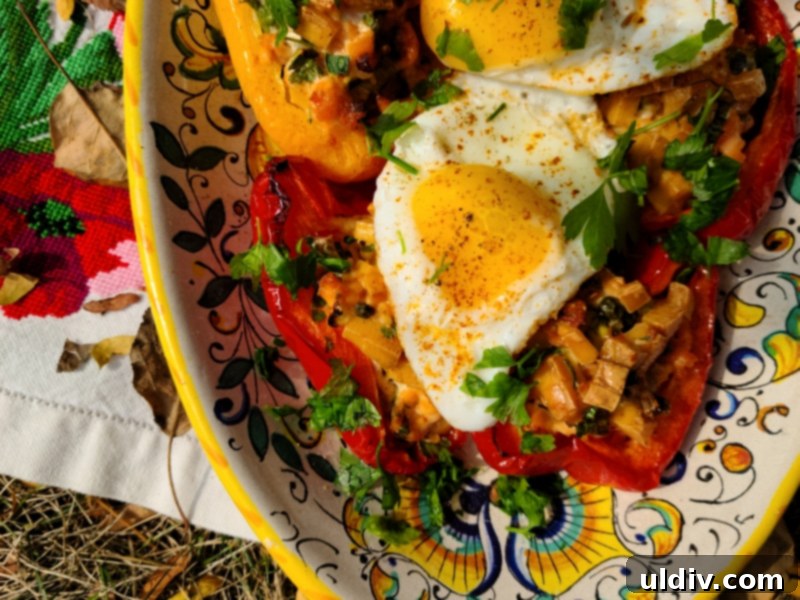 New Year's Kickoff Salmon and Gouda Stuffed Peppers 6 Close-up of a perfectly cooked stuffed pepper topped with a sunny-side-up egg