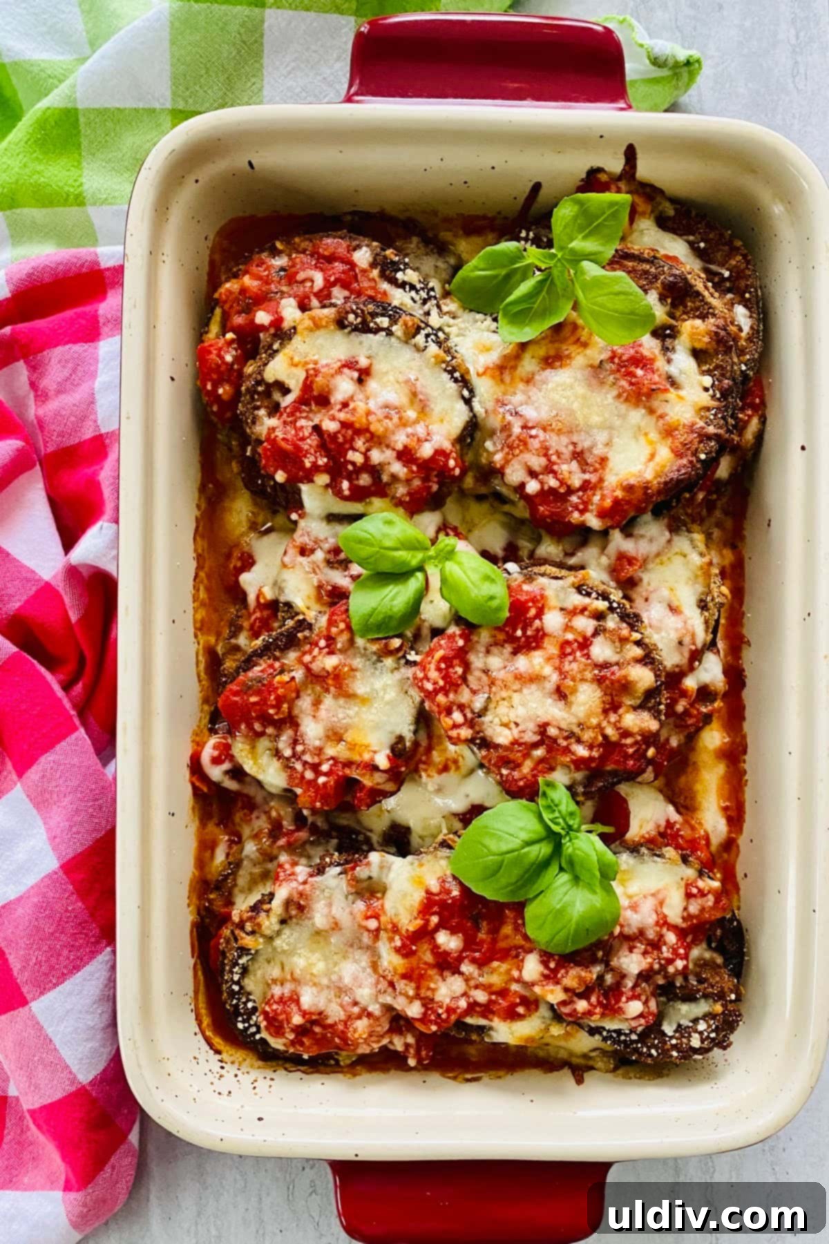 Crispy Oven-Baked Eggplant Parmesan 6 A full baking dish of Baked Eggplant Parmesan, golden and bubbly from the oven, ready to be served.