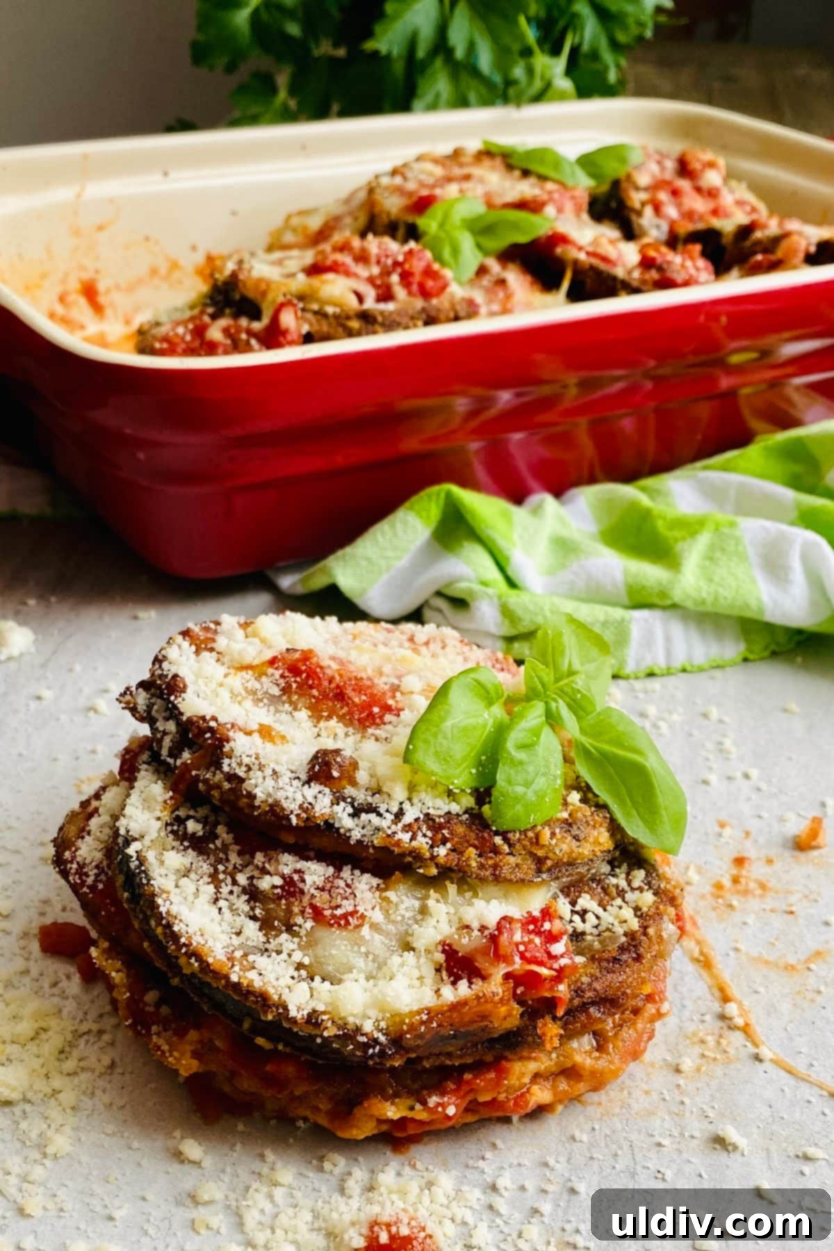 a single piece of baked eggplant Parmesan
